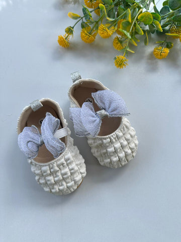 Puff weave bow flats